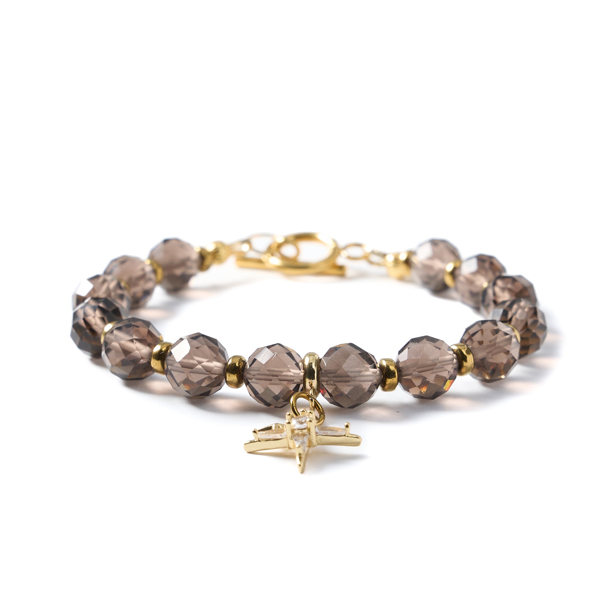 Armband aus facettiertem Rauchquarz und Hämatit mit goldfarbenen Elementen und dekorativem Anhänger