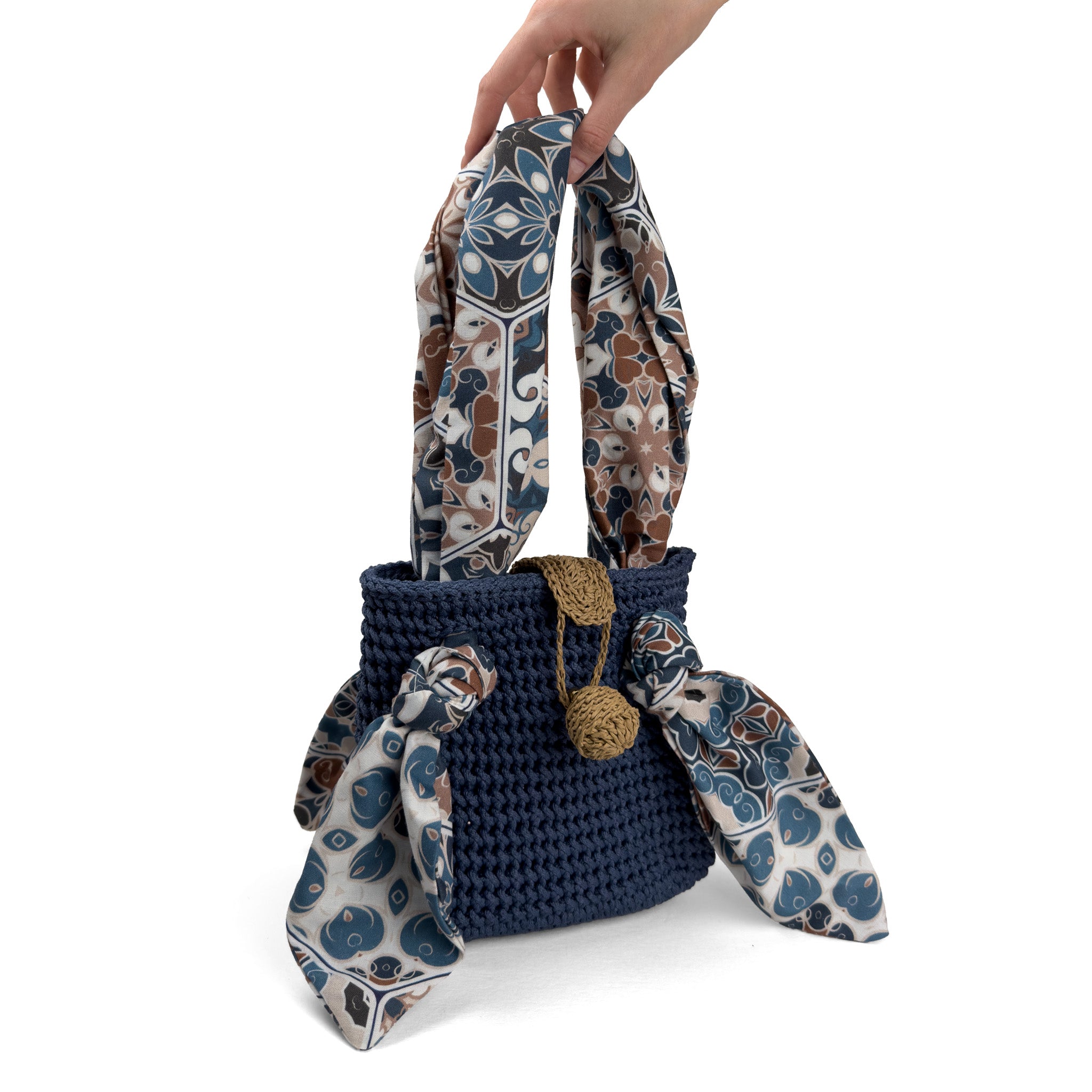 Handgefertigte dunkelblaue Häkeltasche mit gemusterten Schalgriffen - stilvolles und einzigartiges Accessoire